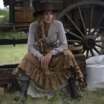 Actress Faith Hill portraying Margaret Dutton in the 1883 series wearing the original brown felt gambler-style hat that inspired the replica.